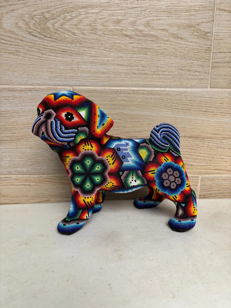 Huichol Pug dog statue lined with tiny beads