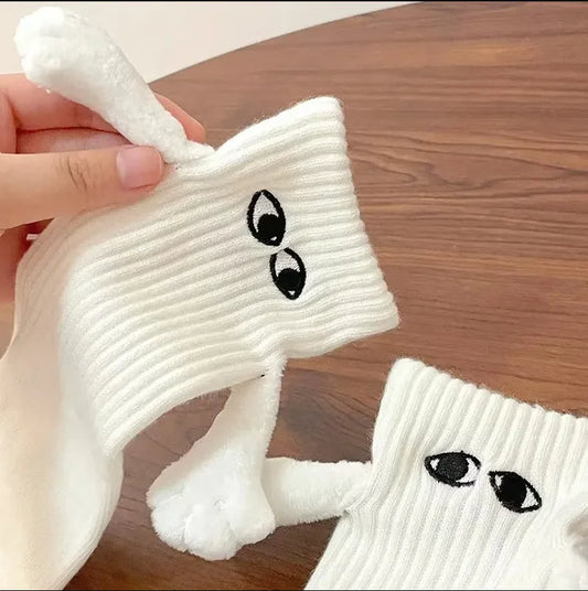 Hand Holding Socks Bunny Style